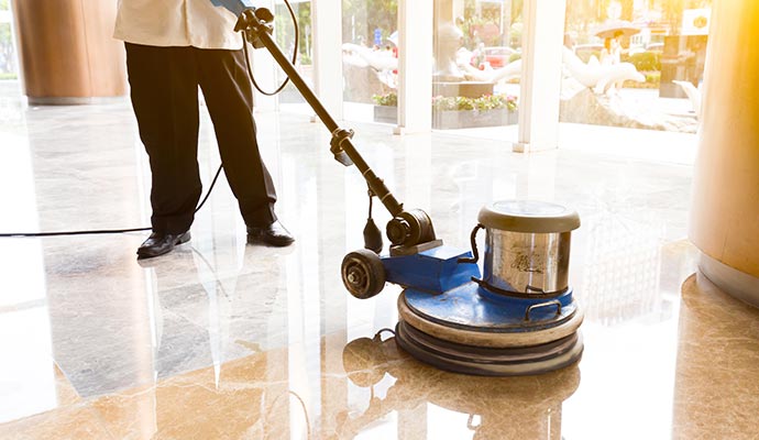 people clean floor indoors building cleaning